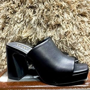 Open toe Mules.  size 6